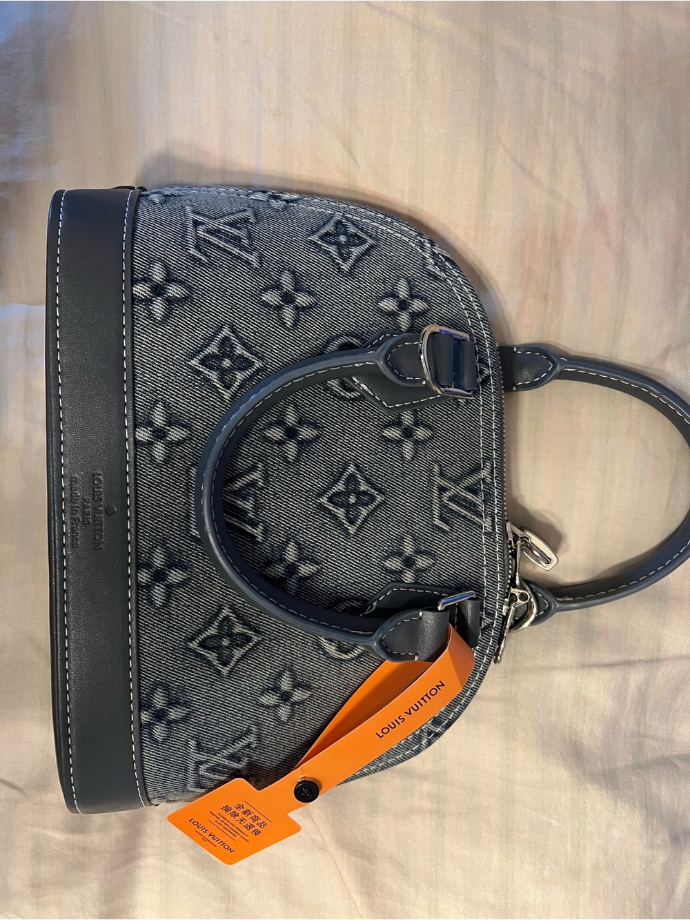 Louis Vuitton Denim Monogram Alma BB Satchel in Blue with Orange Tag